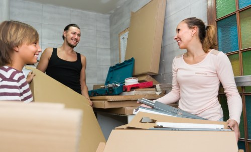 Removal team handling a home move in Ilford street housing