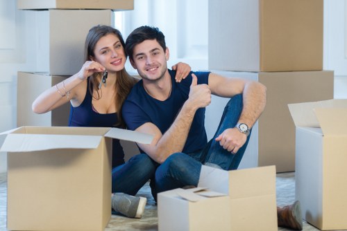 Furniture removals team handling house move loading in Ilford