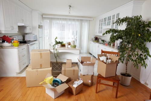 Commercial office move with labelled boxes and workstations