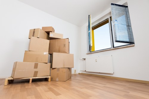 Local piano movers navigating tight residential access in Ilford