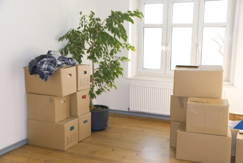 Local removals team loading belongings near Ilford residences