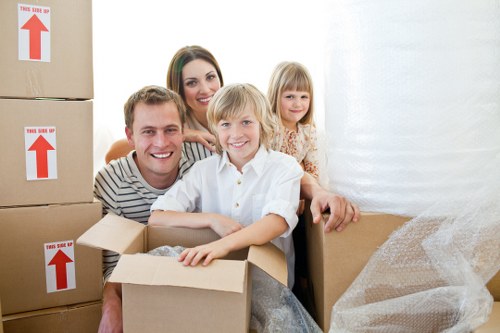 Mover handling furniture carefully during a relocation job