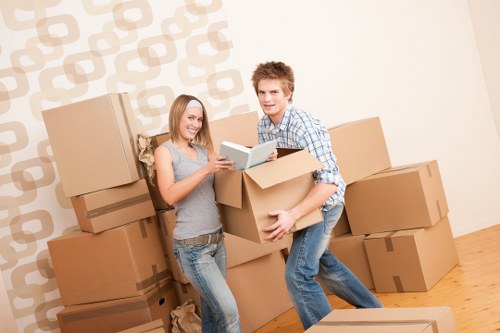 Trained movers using careful lifting and protective moving equipment