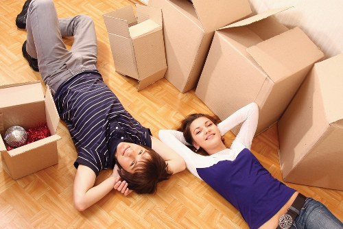 Moving day checklist and packed boxes in a flat