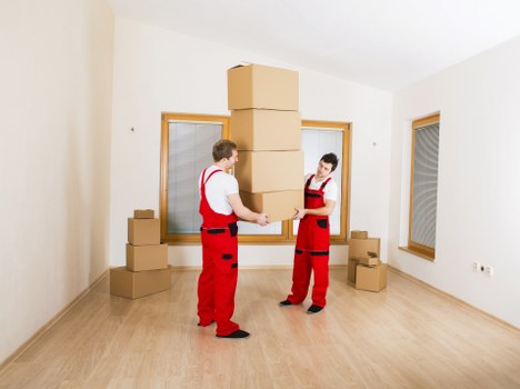 Loading household furniture into a removal van in Ilford