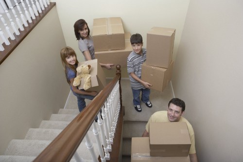 Loading furniture into a moving truck for an Ilford move